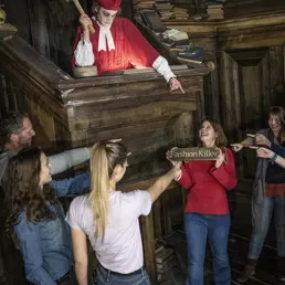 A visitor is sentenced by the judge at the Berlin Dungeon.
