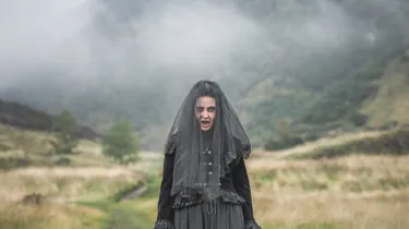 Scary woman on mountains
