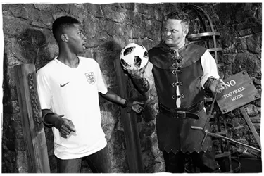 The torturer with a footballer trapped